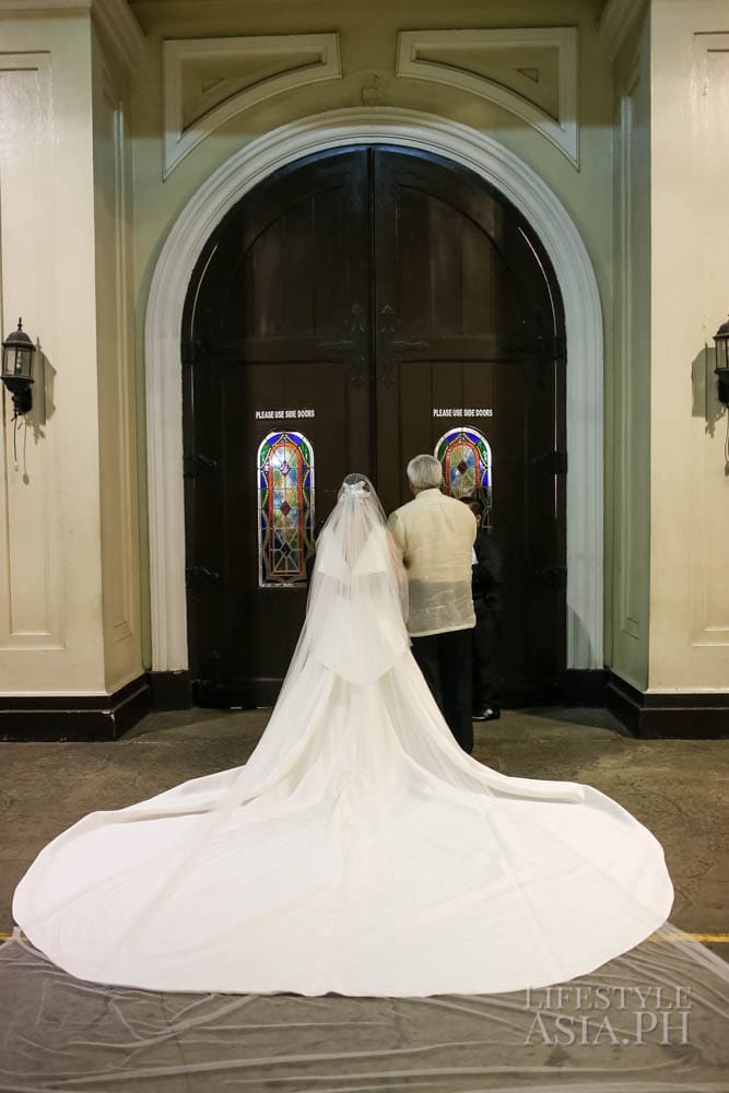 Father and daughter await to walk down the aisle