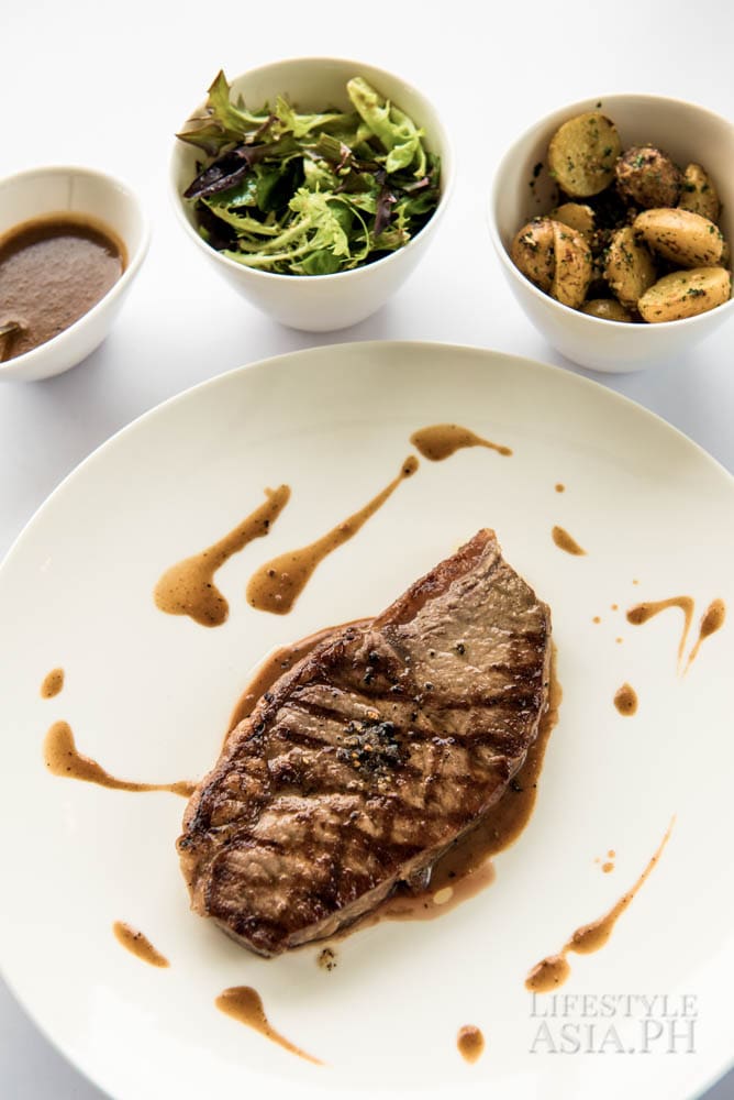 The butcher's cut comes with a variety of sides including potato wedges and salad