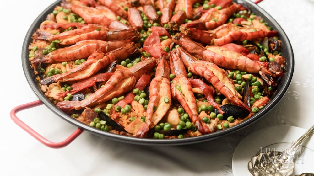 Susie Ortigas approximates the measurements of the ingredients for her paella