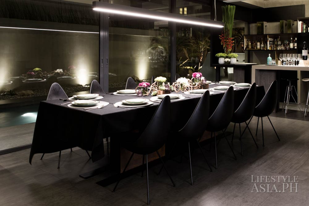 A dinner set-up for a select wine club held in a home Carlo designed