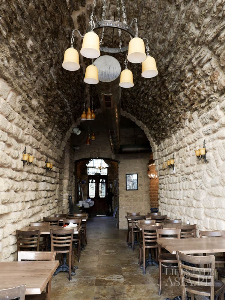 The original stone walls and ceilings of an old building, are now part of a restaurant