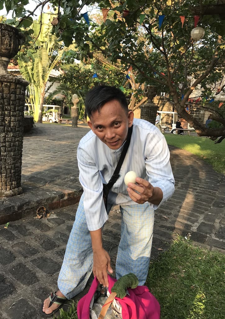 A balut vendor sells the Filipino delicacy around the property 