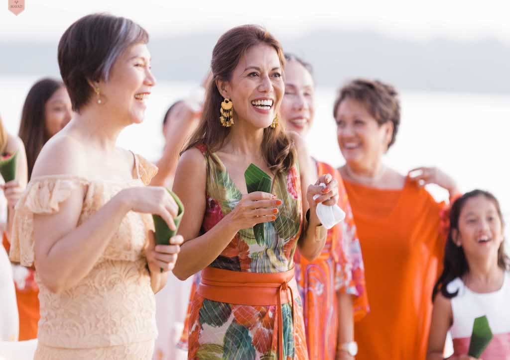 The mother of the groom Ginny de Guzman, mother of the bride Francia Rances