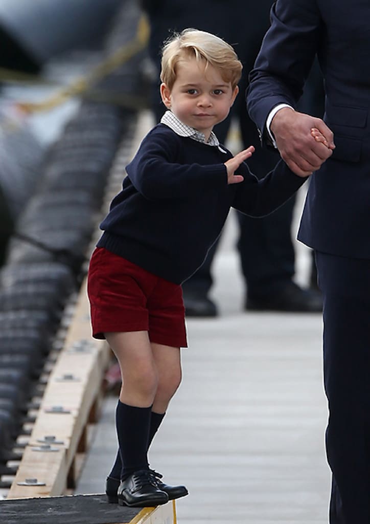 His signature Princely outfit includes well-tailored shorts, sweater, polo shirt, leather shoes and matching socks (photograph courtesy of Hello Magazine)