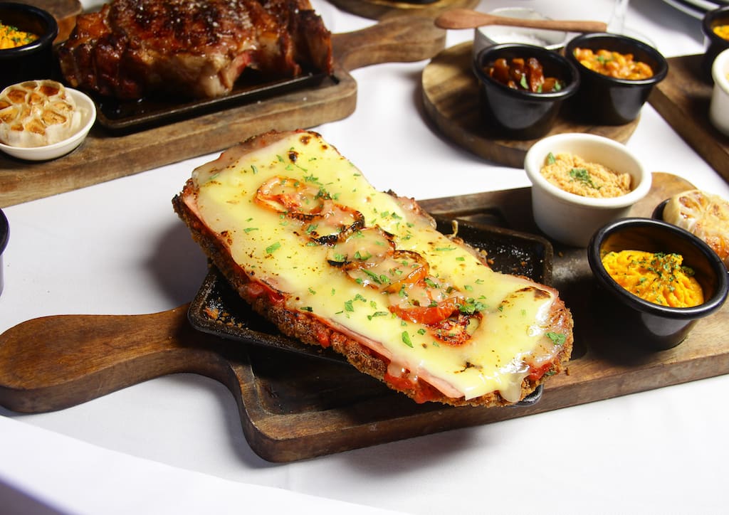 Milanesa de Carne Napolitana (Prime Striploin with Provolone Cheese)