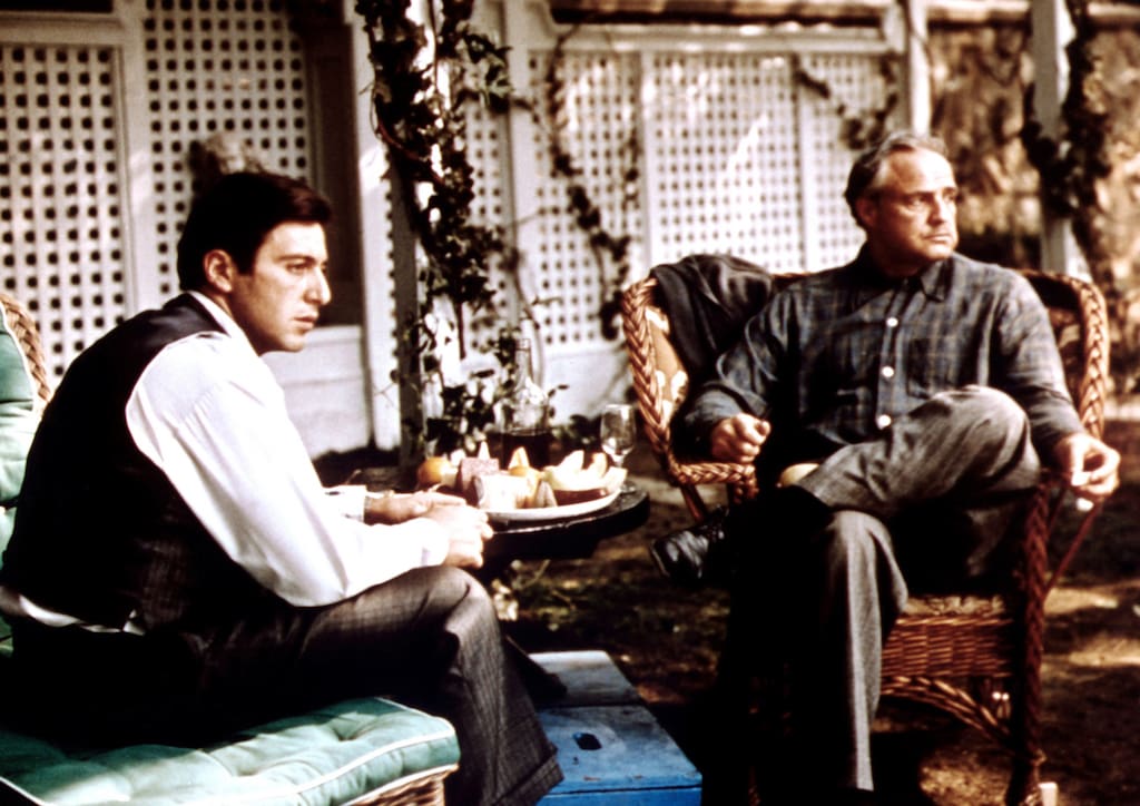 Al Pacino and Marlon Brando in The Godfather (1972)