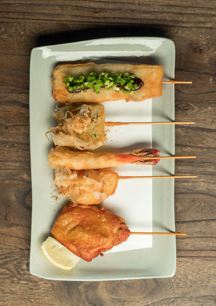 Mariawase Kishikatsu, a sampler lpate of breaded and deep-fried boneless chicken, pork belly, ebi, akra, and onion on sticks