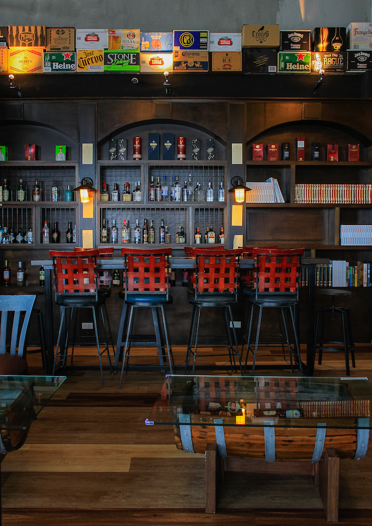 Walls are lined with premium spirits, which also serves as the bar's stock