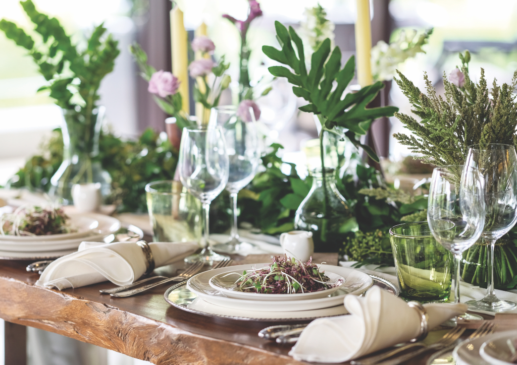 Antique silverware from a private collection was combined with modern Lucerne chinaware for the countryside feast (Photograph by Ed Simon)