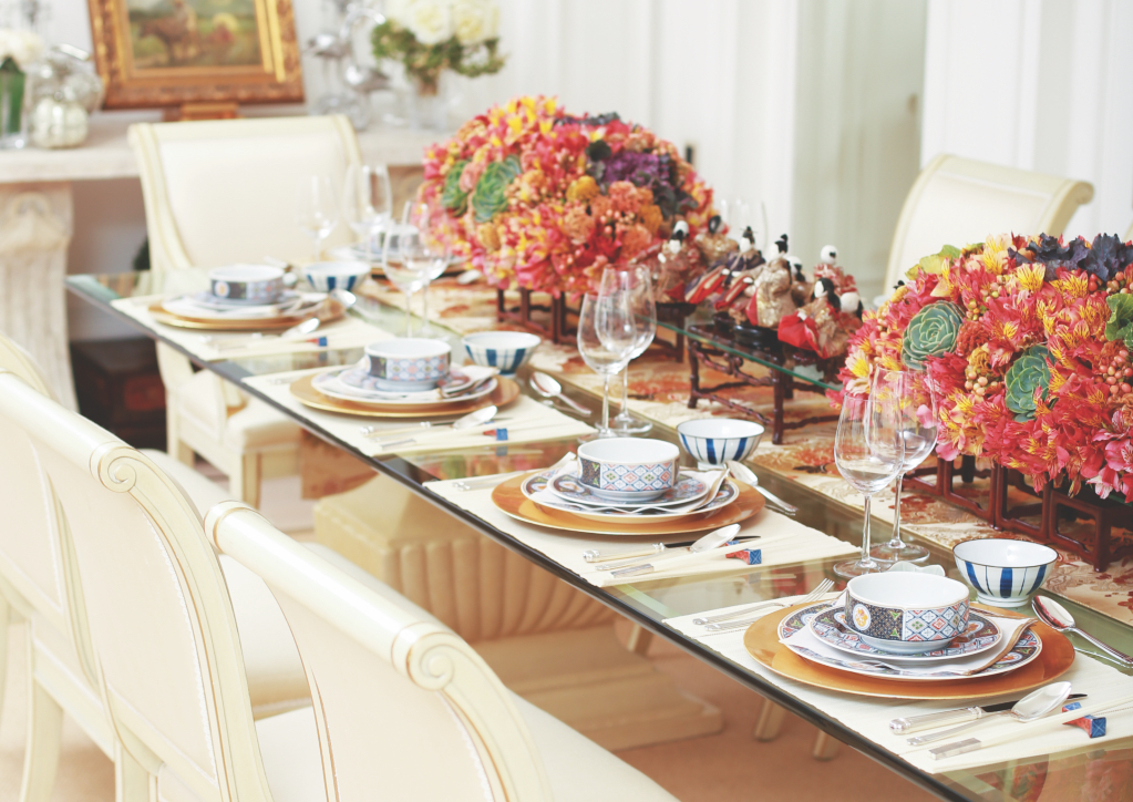 Agnes Huibonbua's tablescape is enlivened by floral arrangements in pastel hues (Photograph by Reau Guttierez).
