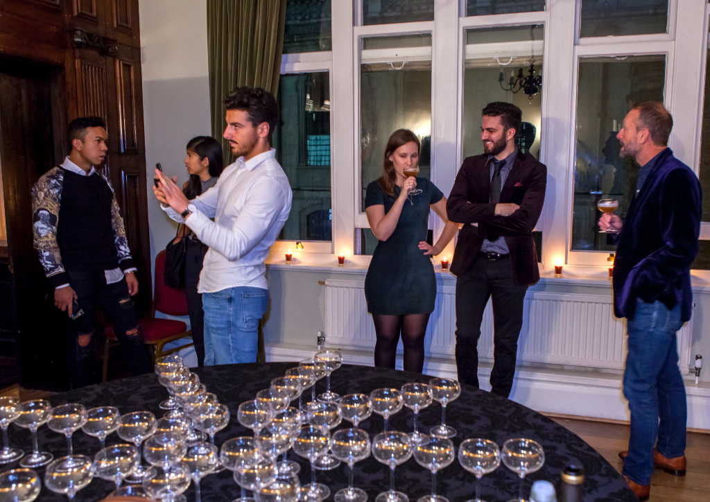 Guests enjoying cocktails before dinner