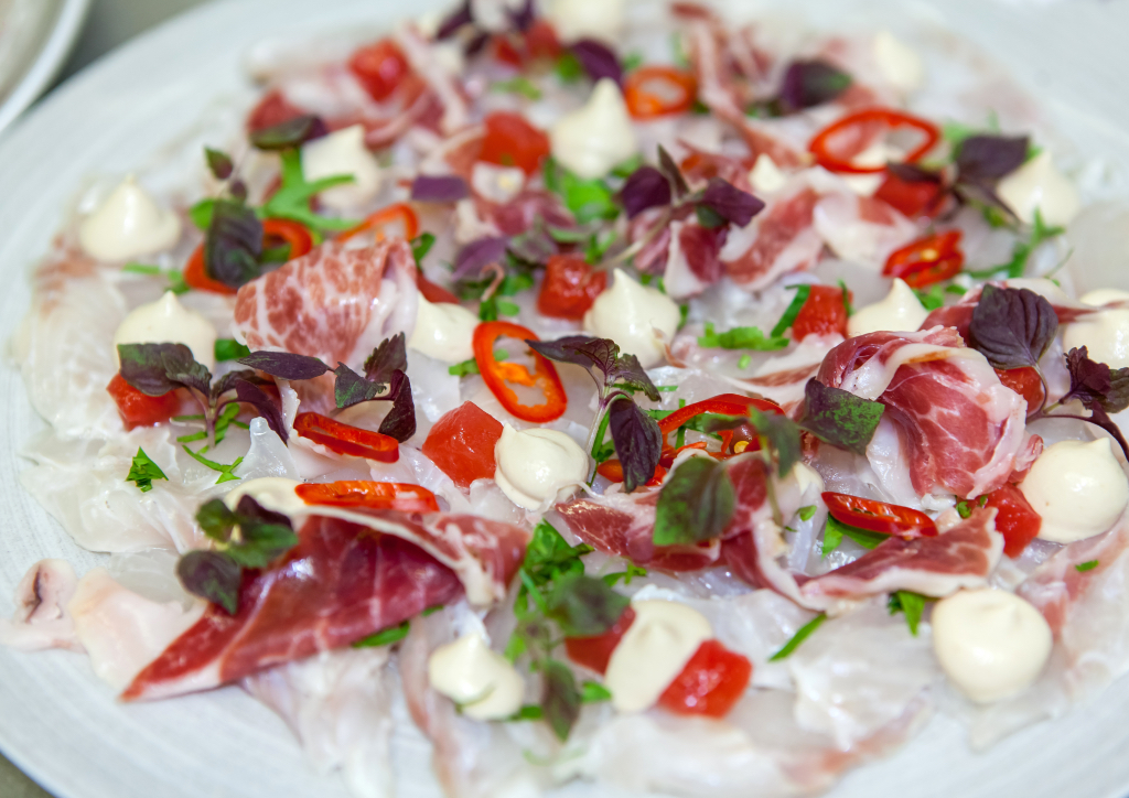 Seabass kinilaw with ajoblanco, pickled watermelon, and jamón iberico