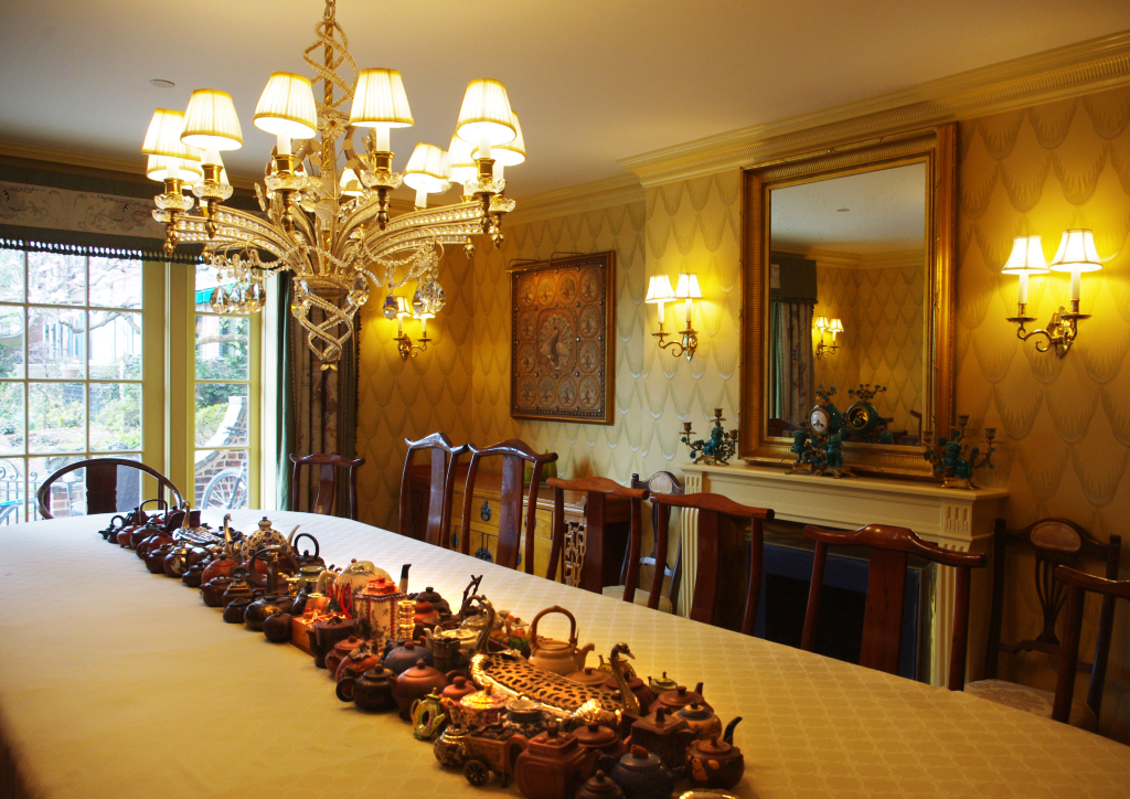 The mahogany dining table can seat 22 guests