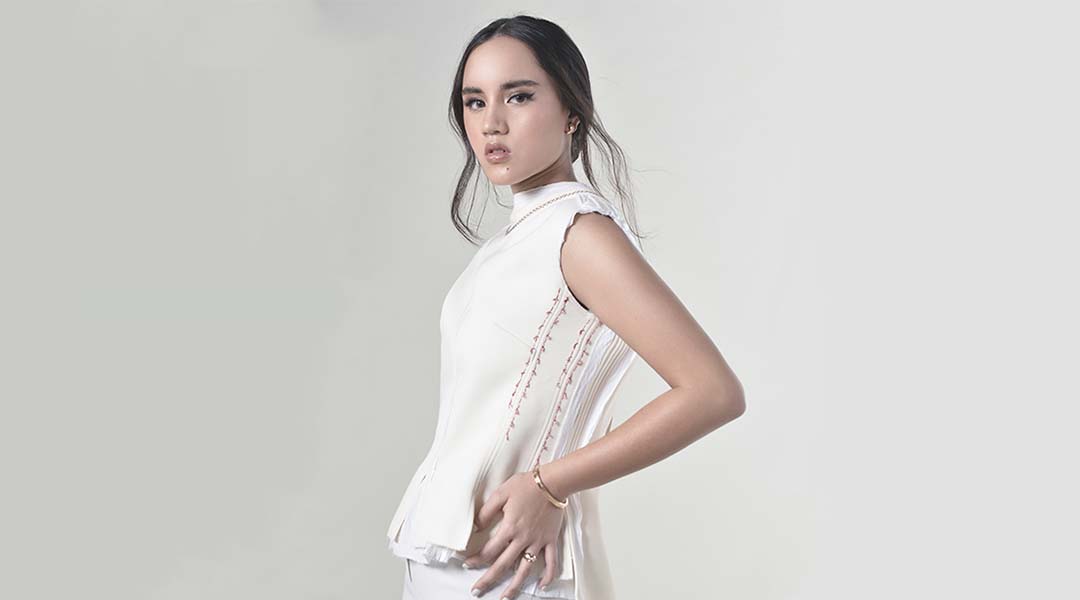 Juliana Gomez in white top and pants