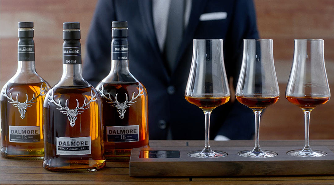 The Dalmore whiskey bottles and glasses