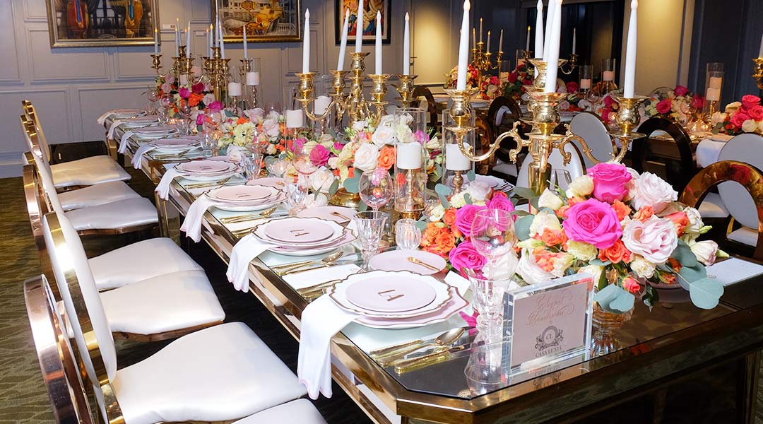 fine dining with flowers and pale pink plates