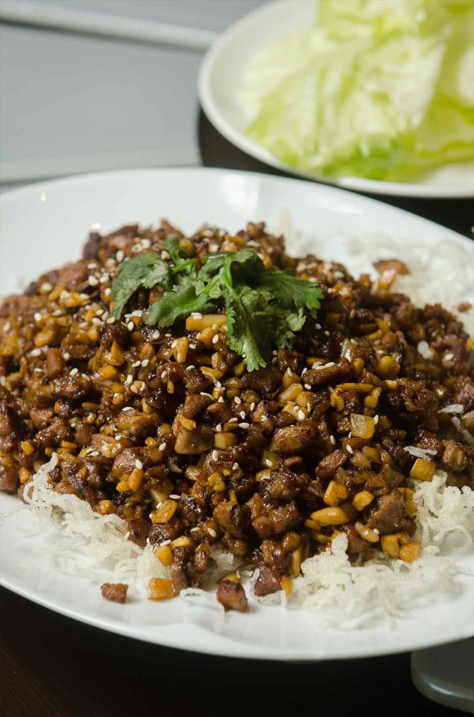 Minced Duck with Cabbage is part of the menu of Man Ho