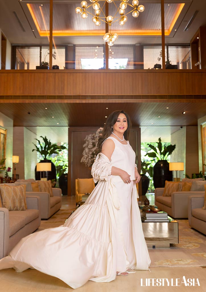 Alice Eduardo in a taffeta gown, VANIA ROMOFF, @studiovaniaromoff; White one-strap heels, JIMMY CHOO, EDSA Shangri-La Plaza