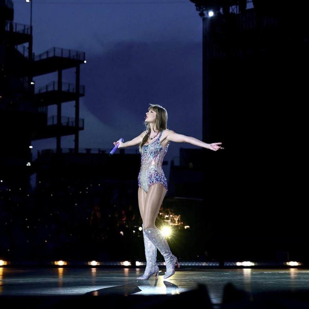 Swift in a custom Atelier Versace bodysuit with sparkly Christian Louboutin boots