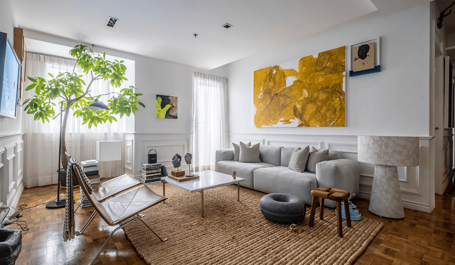 Kiko Escora, Rinne Abrugena and Nice Buenaventura; lamp is by Solano Lamps, next to the HAY Mags Sofa; Finnsauna Lagerholm stool by Olof Ottelin; chairs and table by Poul Kjærholm; head sculptures by Siegrid Bangyay