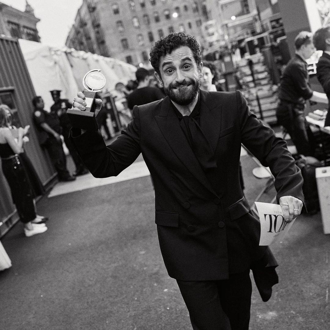 Brandon Uranowitz holding his Tony for his performances in "Leopoldstadt"