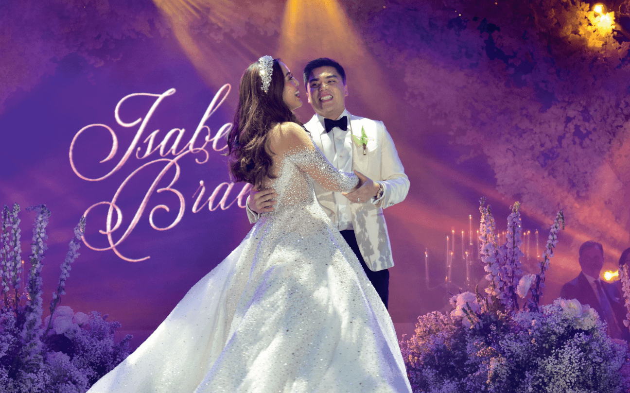 Braeden Biron and Isabella Oca 
sharing a moment during their wedding