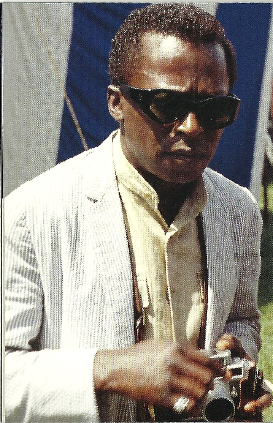 Miles Davis wearing a classy searsucker jacket