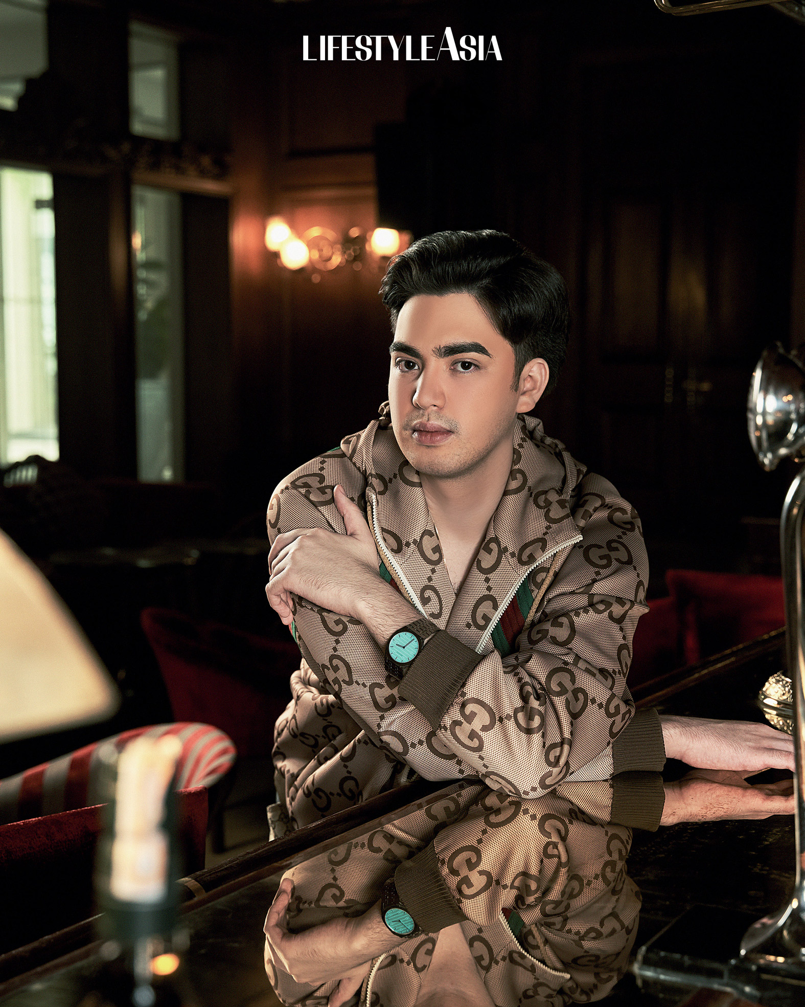 On Julio: Jumbo GG Zip Jacket With Web and Gucci 25h Watch In 38mm, all from GUCCI.