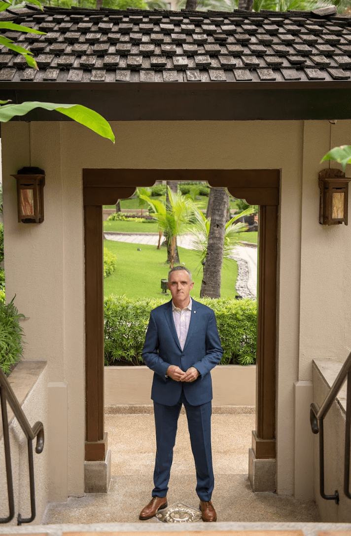 Jonathan Reynolds standing near Chi Spa in EDSA Shangri-La