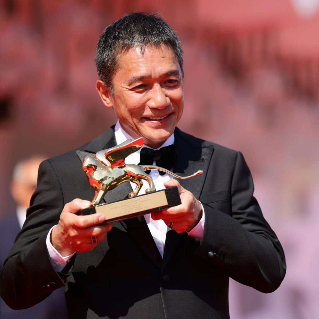 Tony Leung holding his well-deserved Golden Lion for Lifetime Achievement at the Venice Film Festival