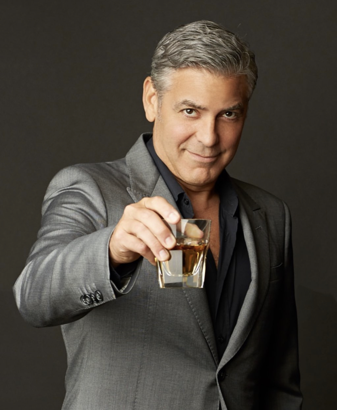 George Clooney holding Casamigos
