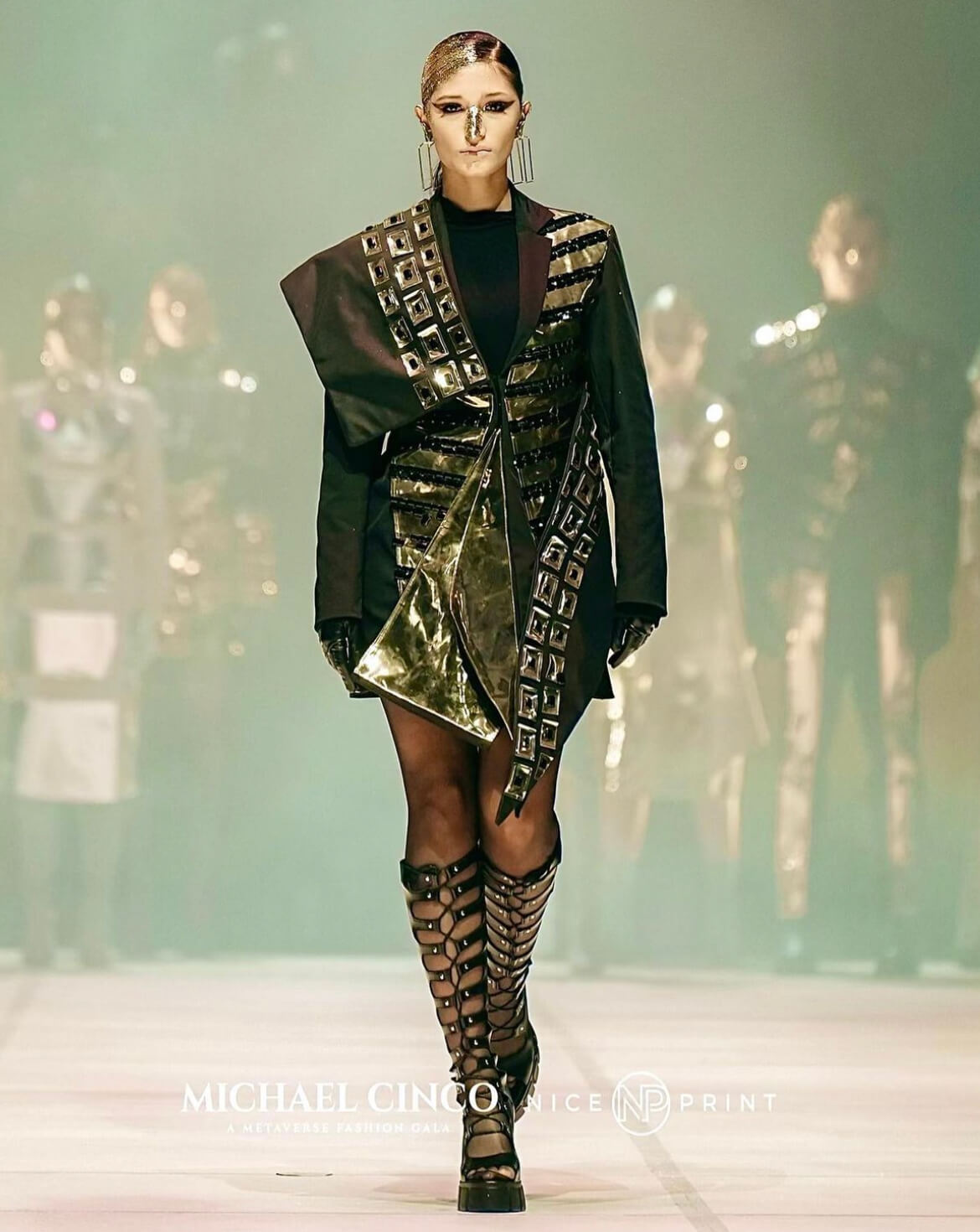 Models strut down the runway during the Michael Cinco Metaverse Fashion Gala. 