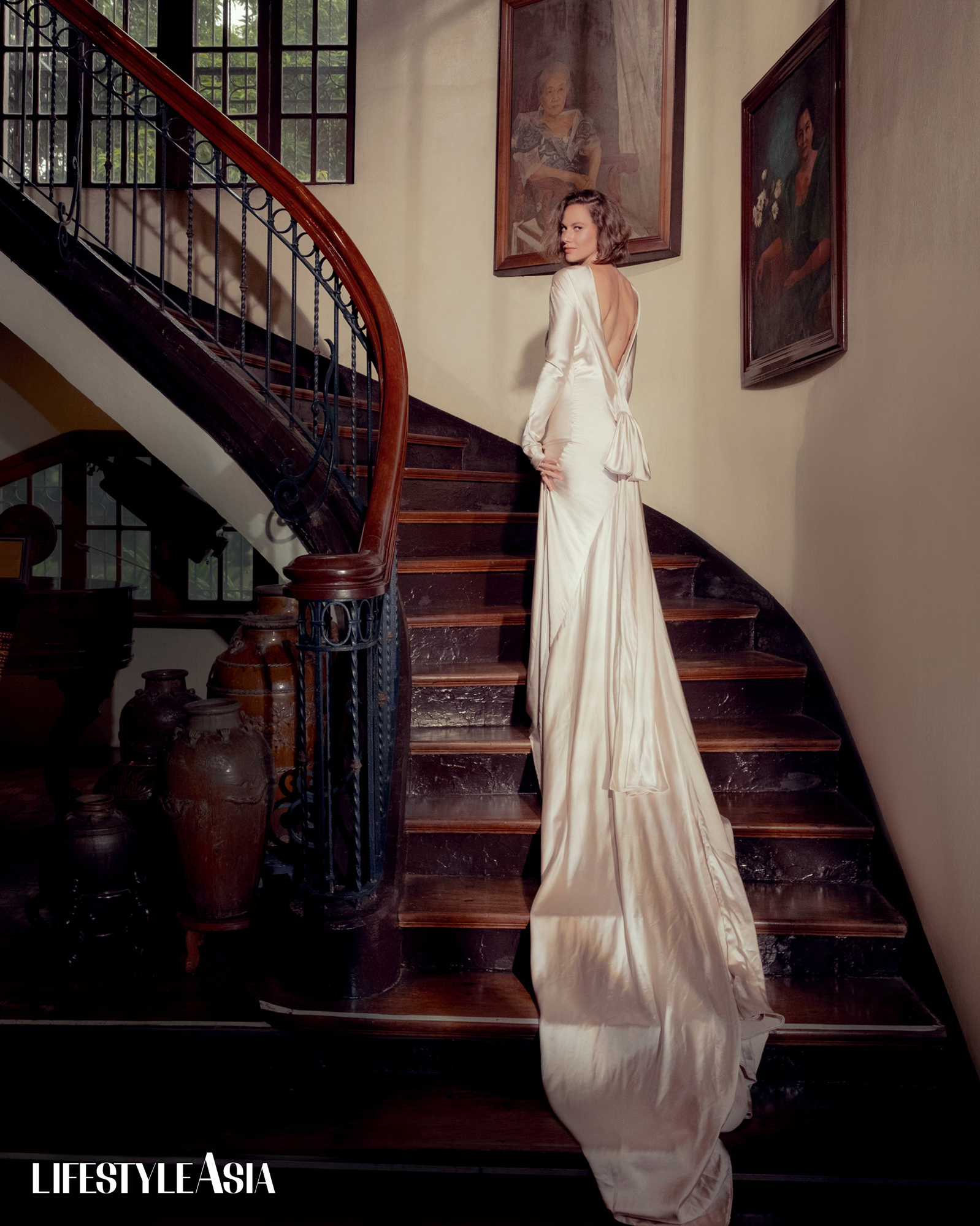 Ivory silk long-sleeved backless dress, JAGGY GLARINO; Diamond drop earrings, JUL B DIZON JEWELLERY.
