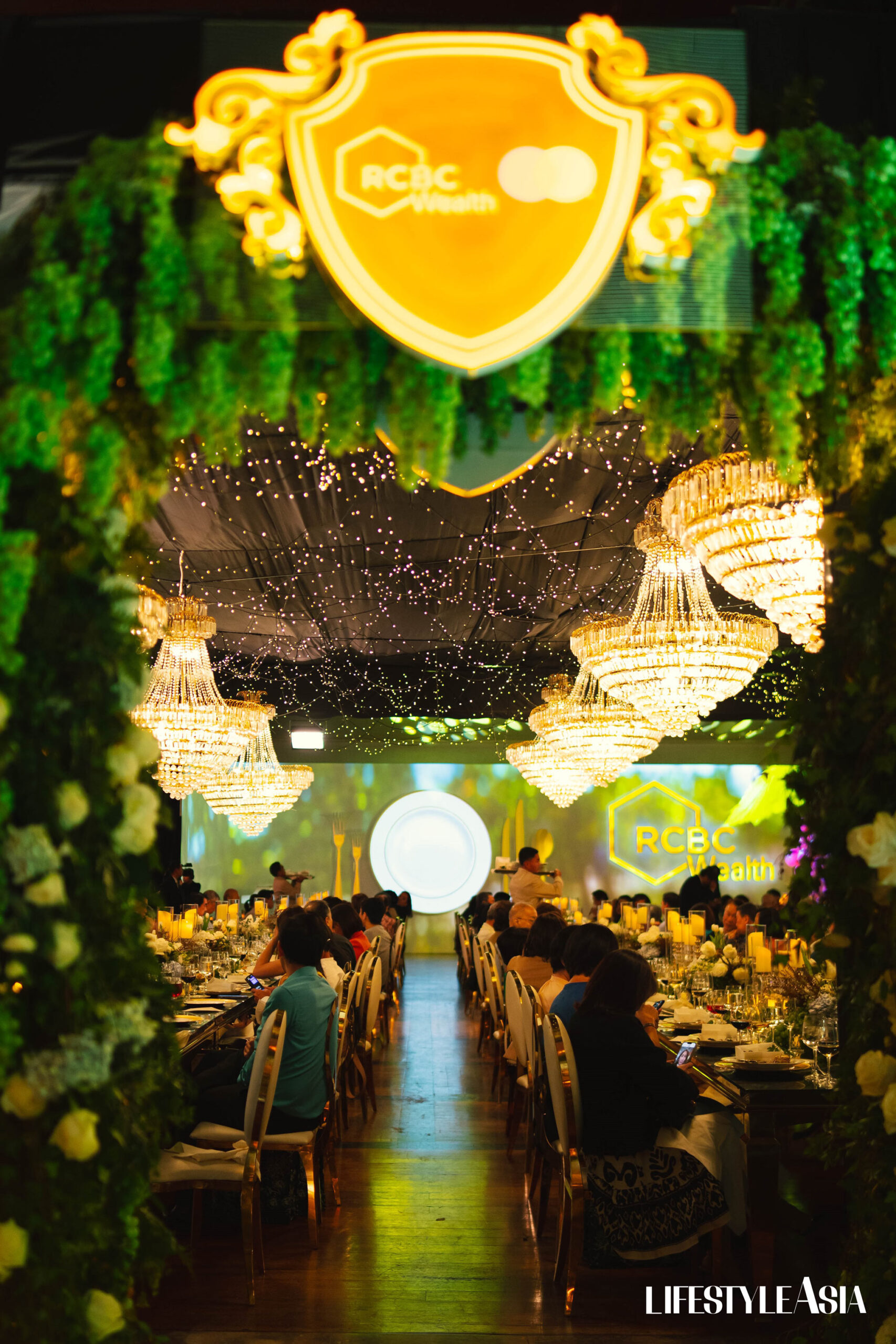 Long tables were laden with lush flowers and grapes as guests enjoyed a delectable dinner