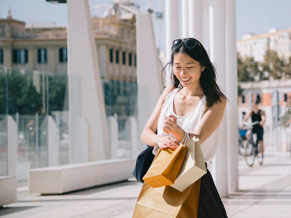 asian woman shopping with EastWest 