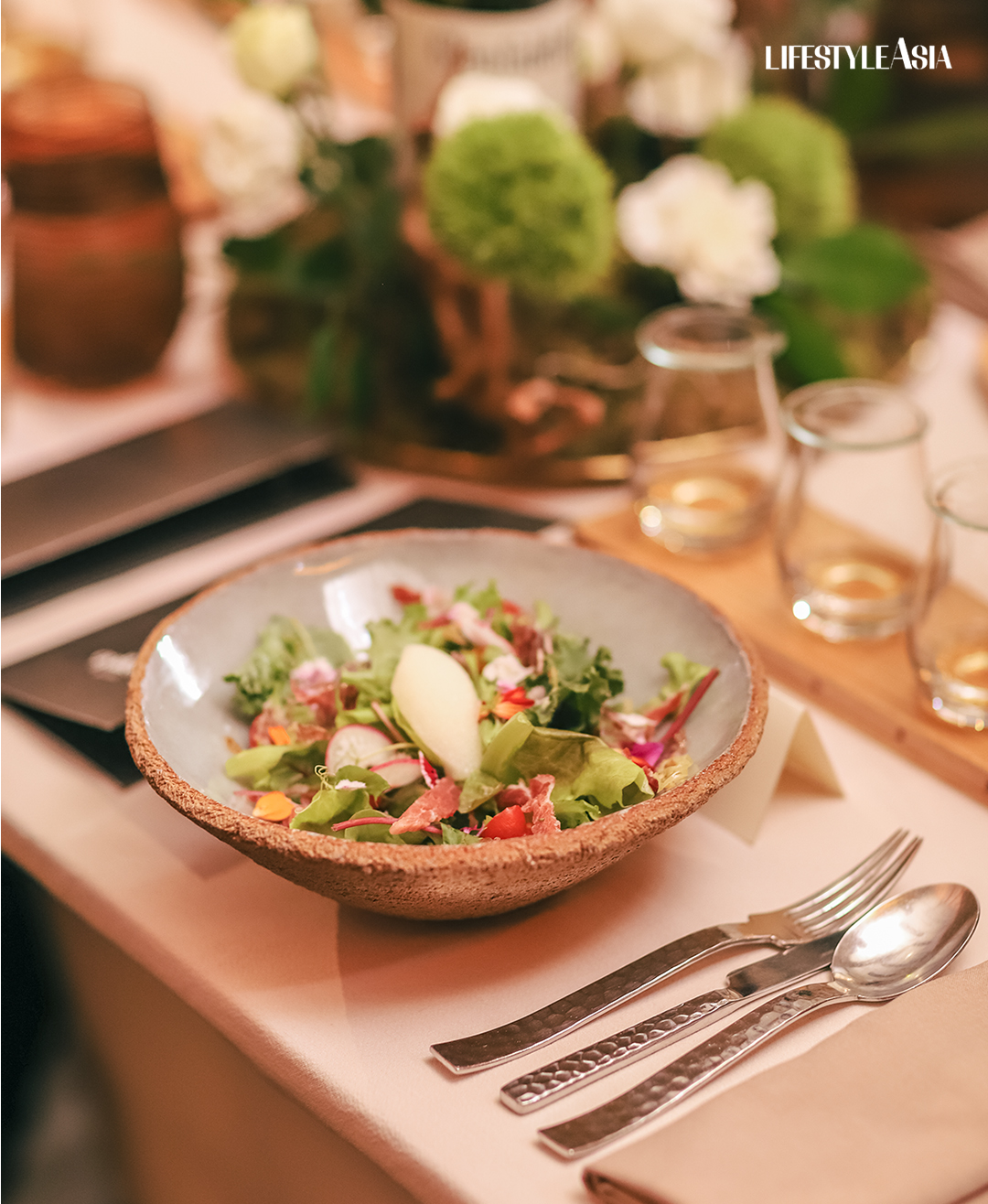 Organic greens, piparras, and yuzu sorbet as appetizer