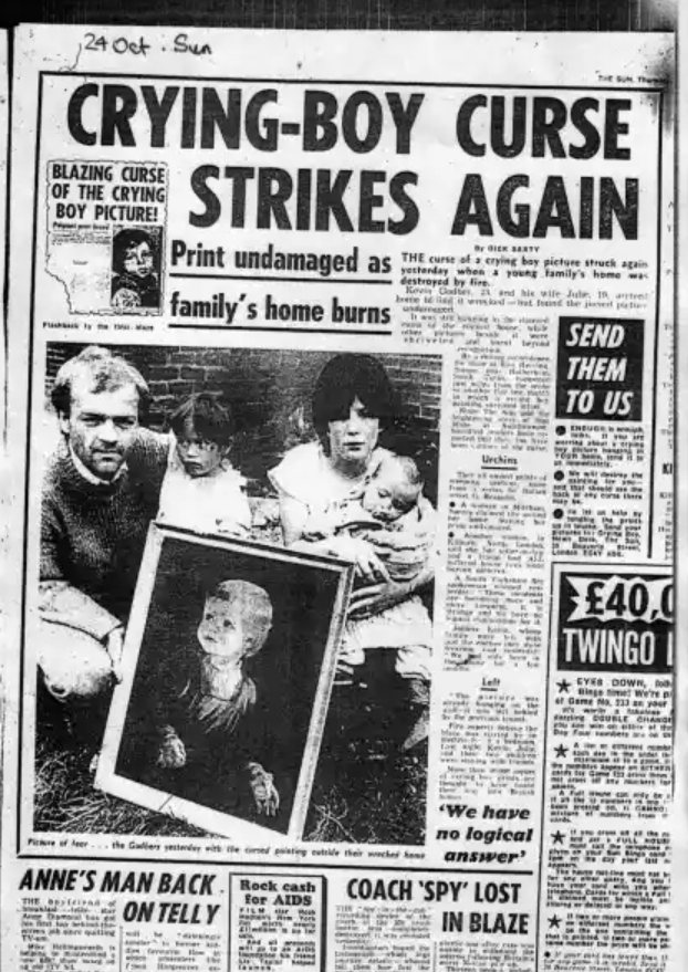 The Sun's newspaper with a feature on the "cursed" crying boy paintings that caused fires across the U.K.
