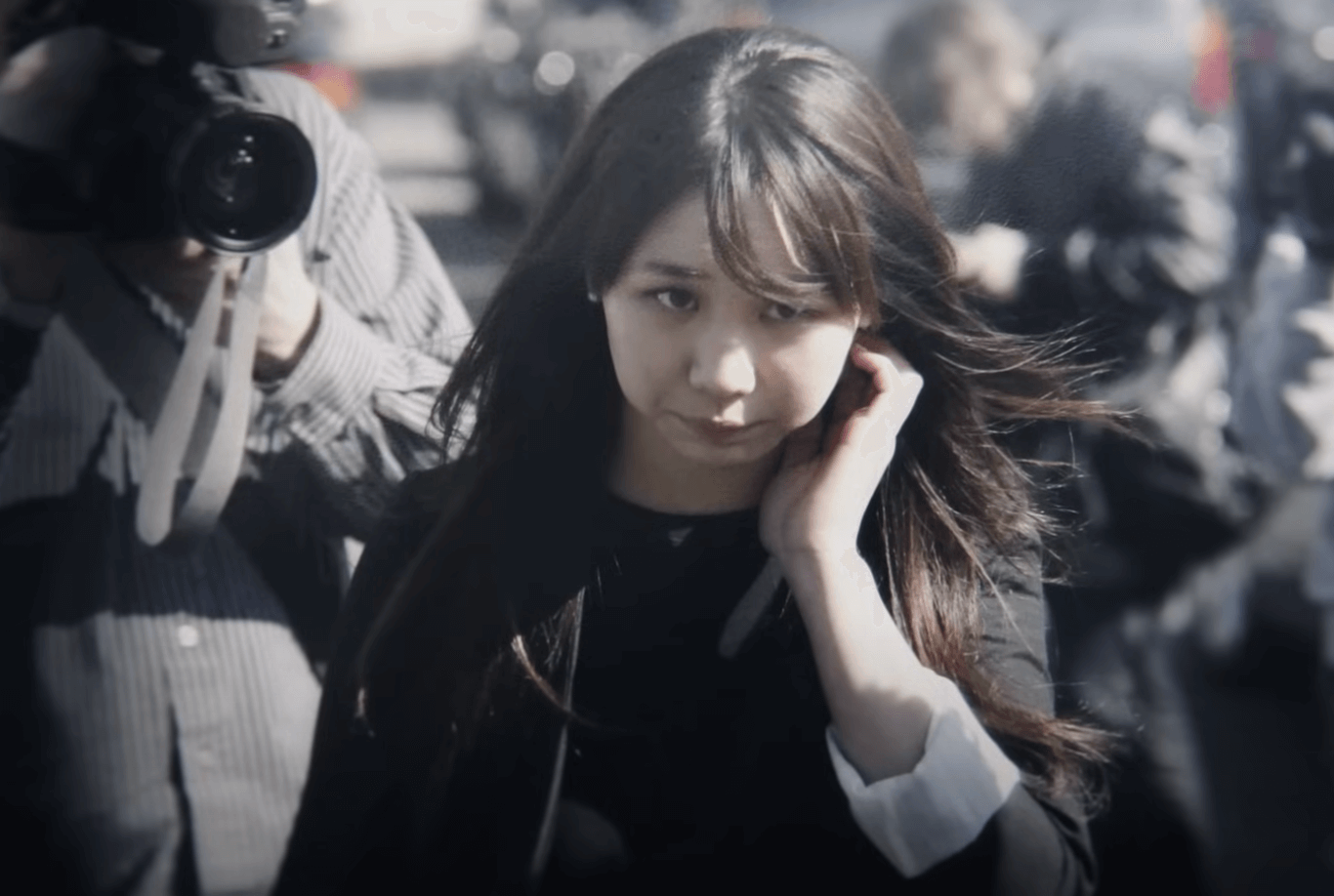 Photo taken after rachel lee was arrested. There were paparazzi behind her.