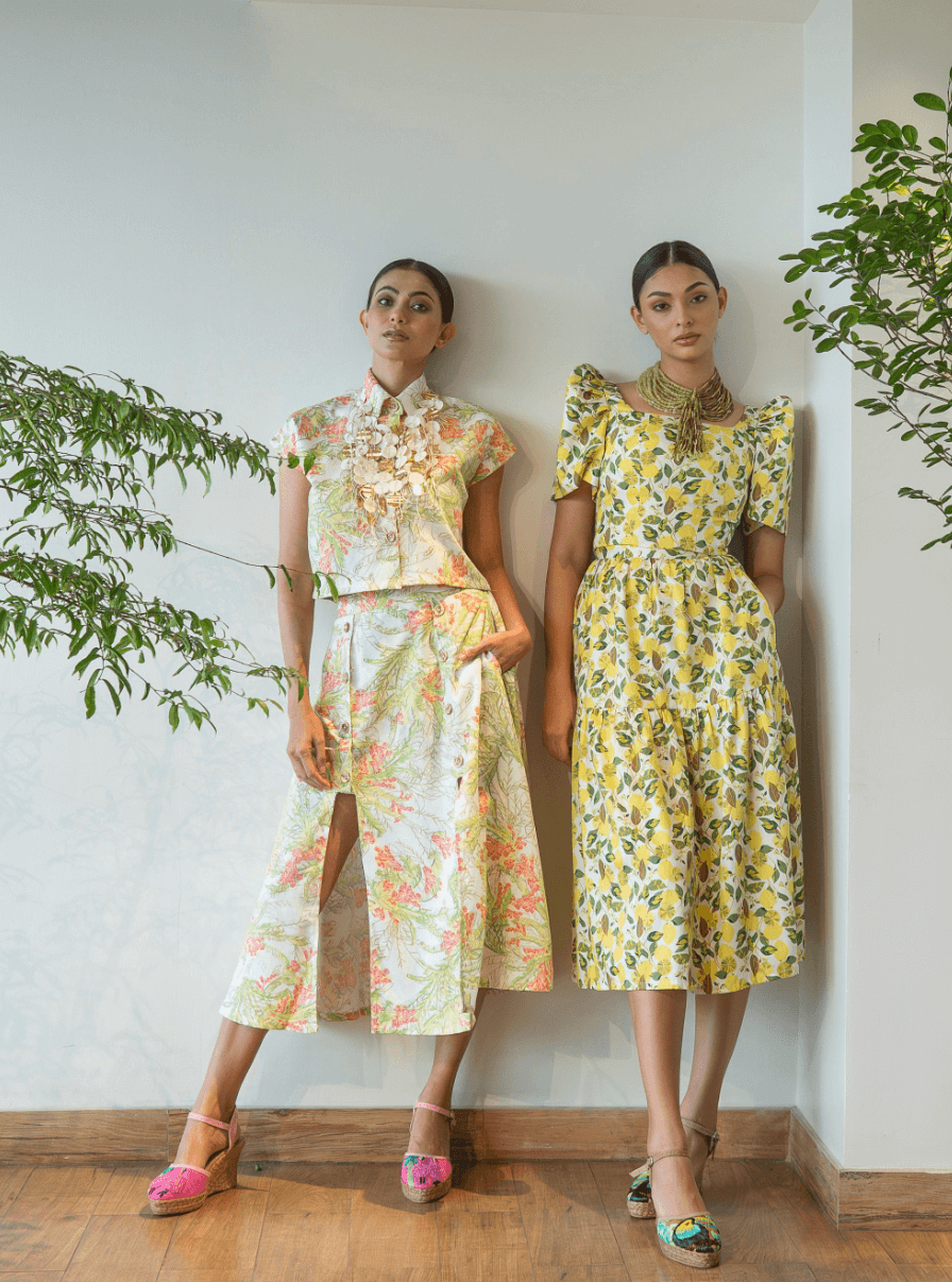 Models posing for the camera wearing beautiful outfit from FilipinaZ: Living Art.