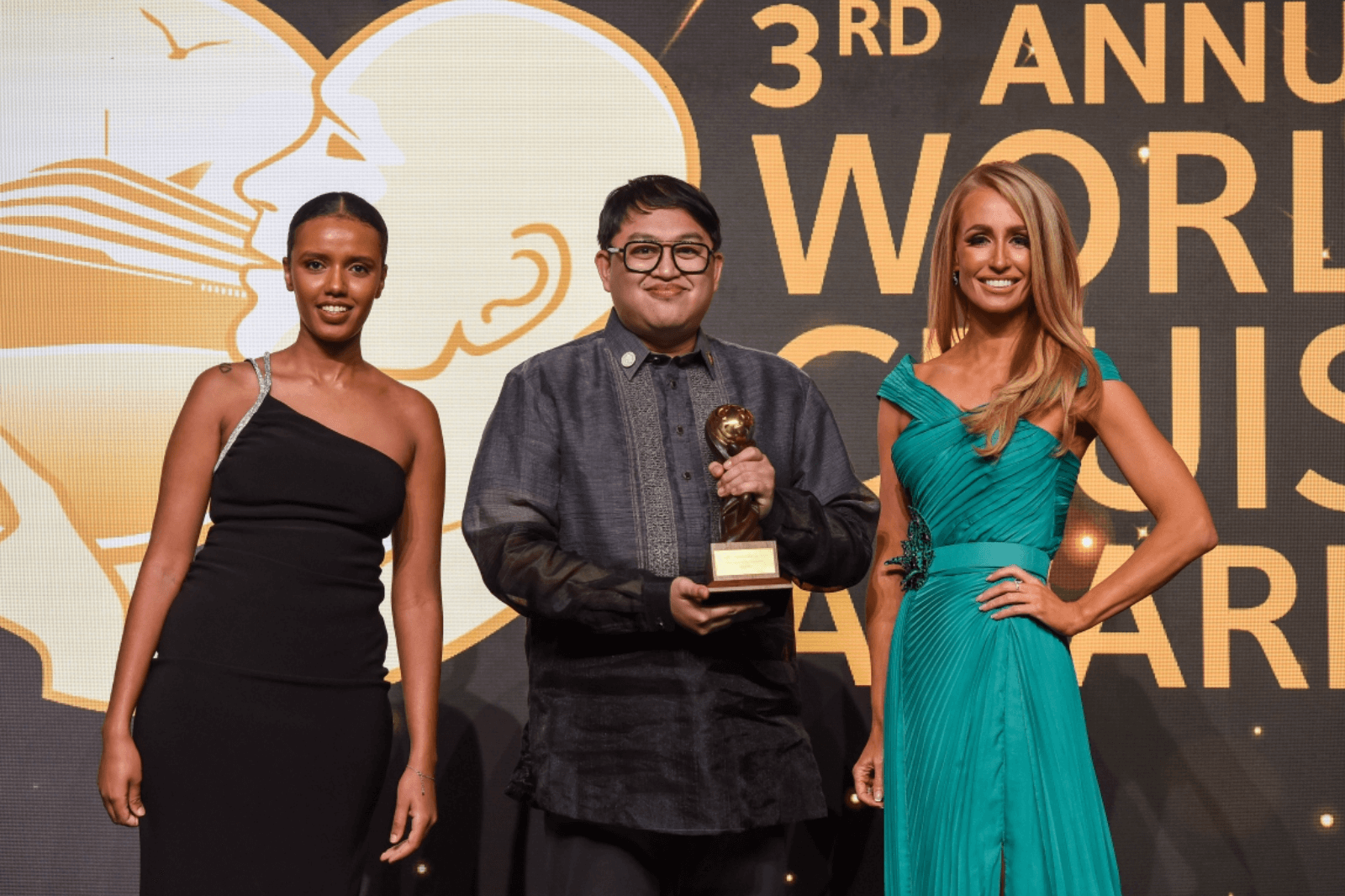 DOT director for product and market development Paulo Benito S. Tugbang accepts the prestigious award in Dubai