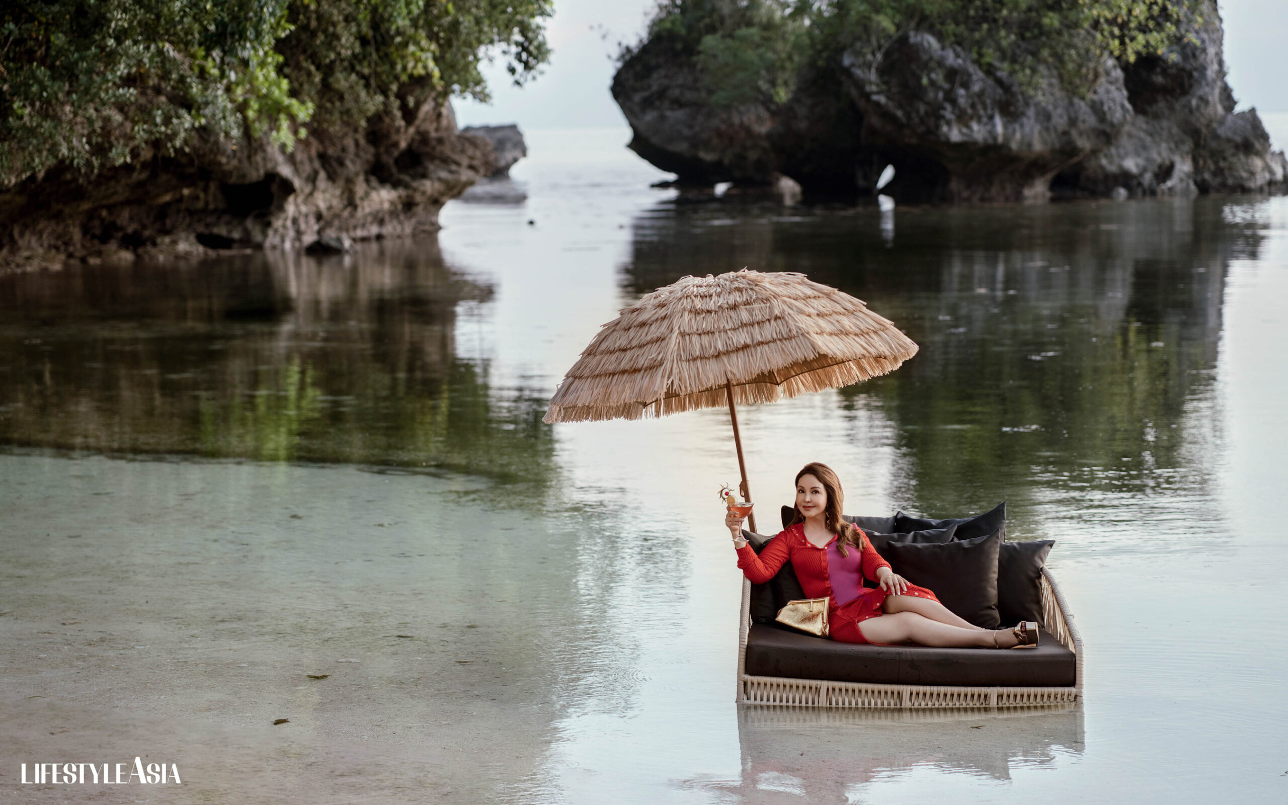 Red and fuchsia knit dress, gold earrings and clutch, FENDI; Gold platform heel, GIUSEPPE ZANOTI.
