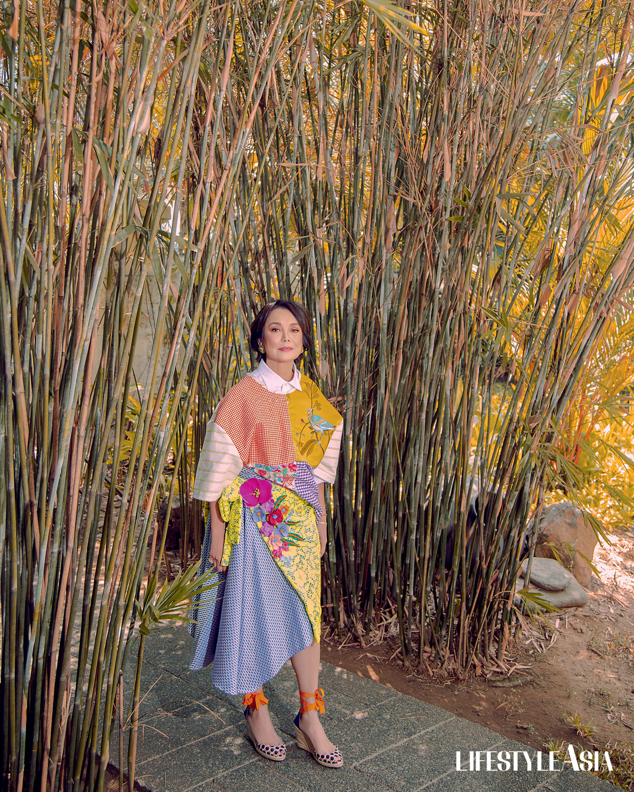 Patchwork top and multicolored skirt, JOR-EL ESPINA; Multicolored gemstone earrings, JMA JEWELRY.