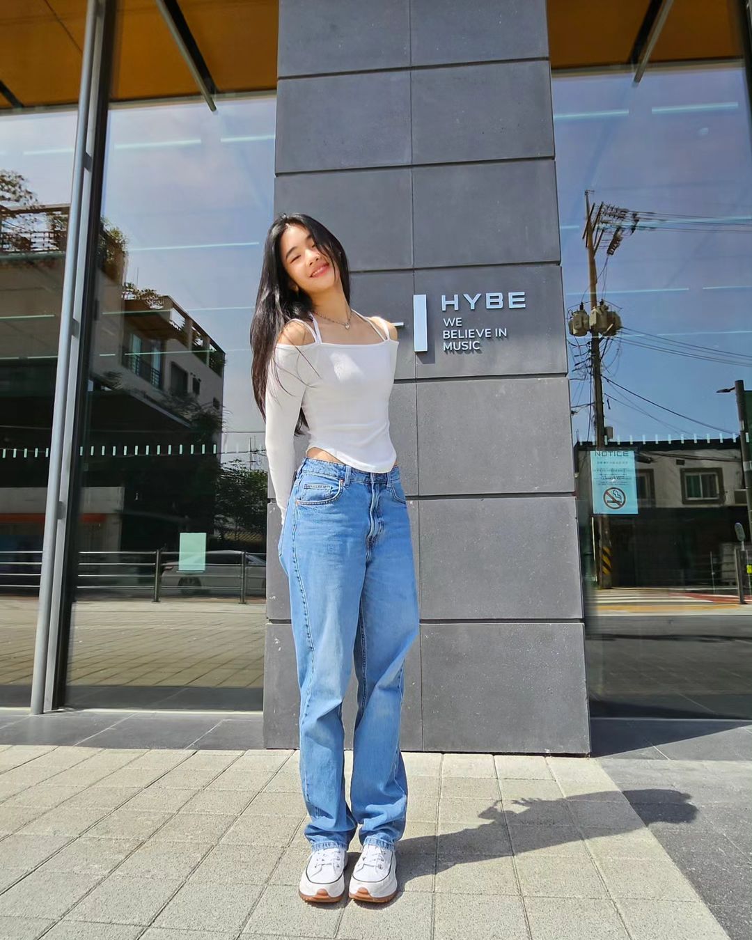 Sophia Laforteza in front of HYBE agency in South Korea