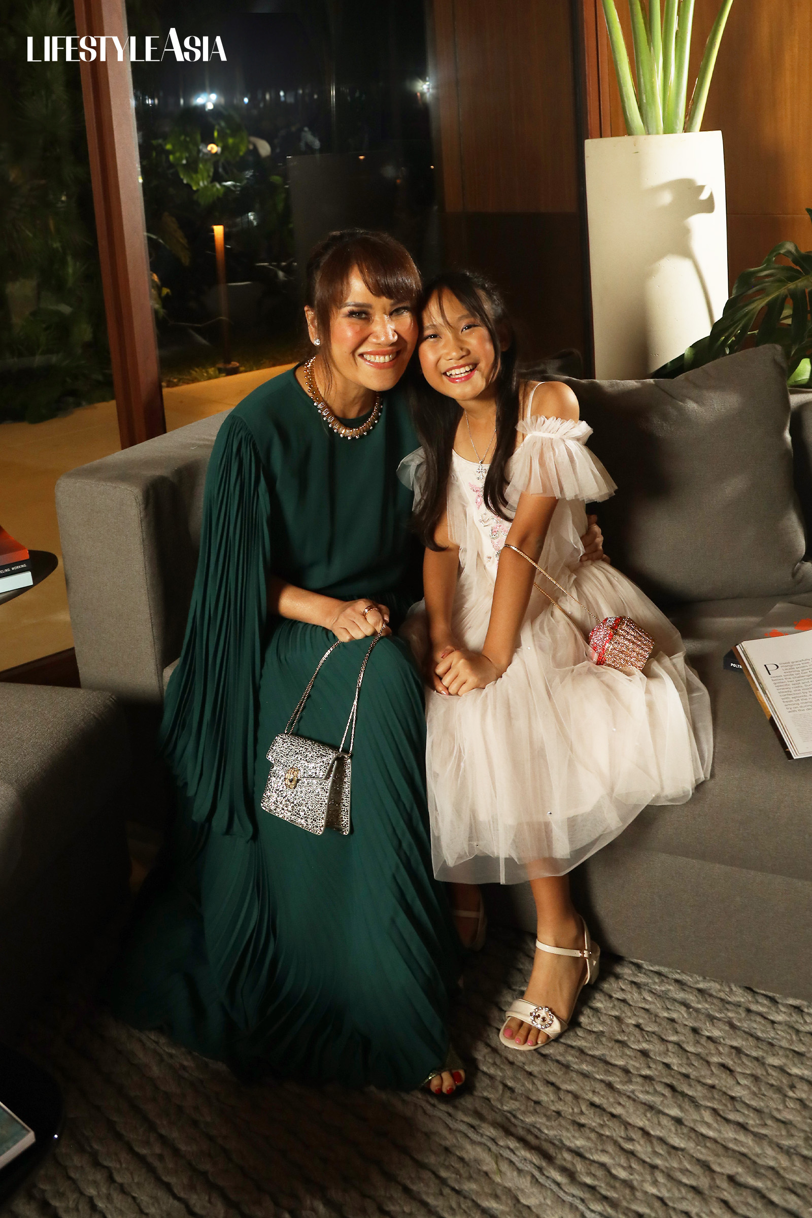 Dr. Aivee Teo and Keli on the Calligaris Dormeus sofa