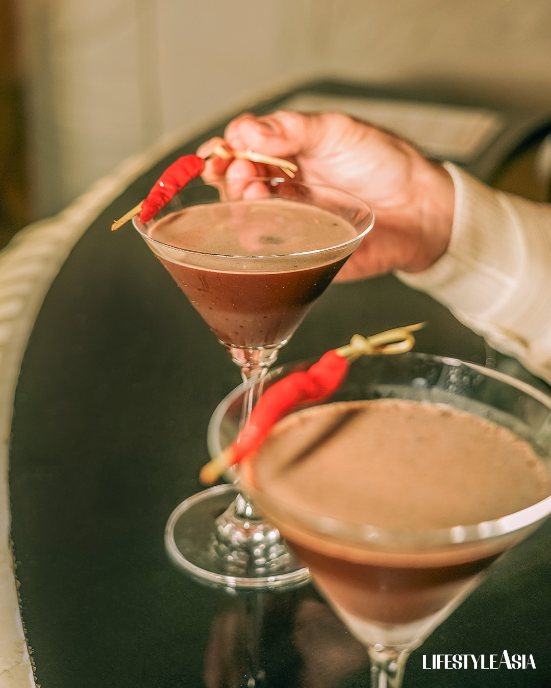 The Spicy Emotion cocktail from Sula Spirits topped with red chili