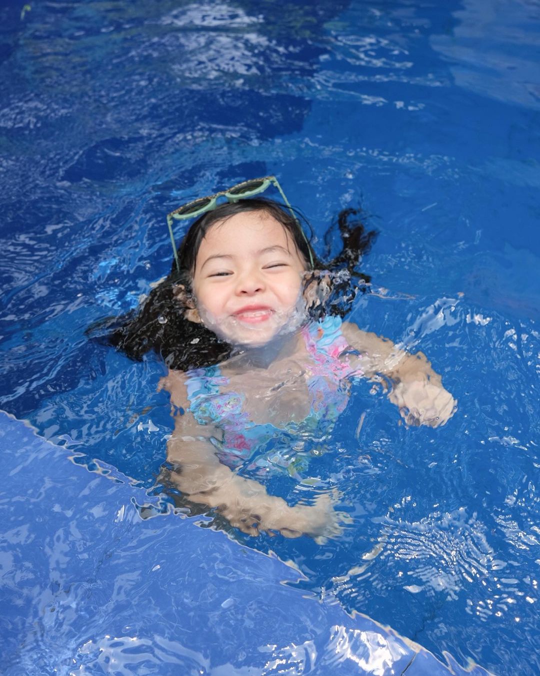 Amelia enjoying summer at the pool