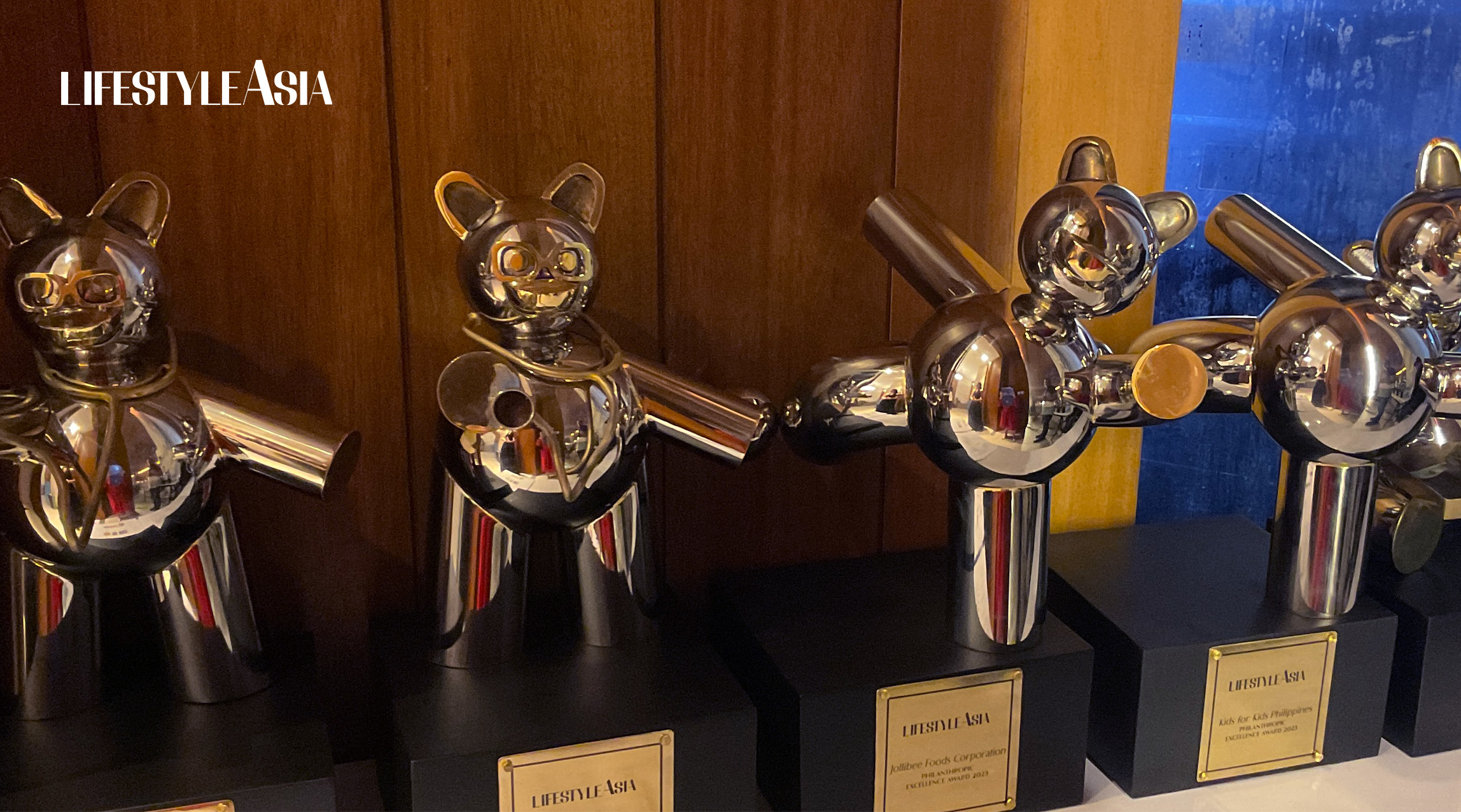 A close look at the Philanthropic Excellence Award trophies for the health category (left) and children category (right)