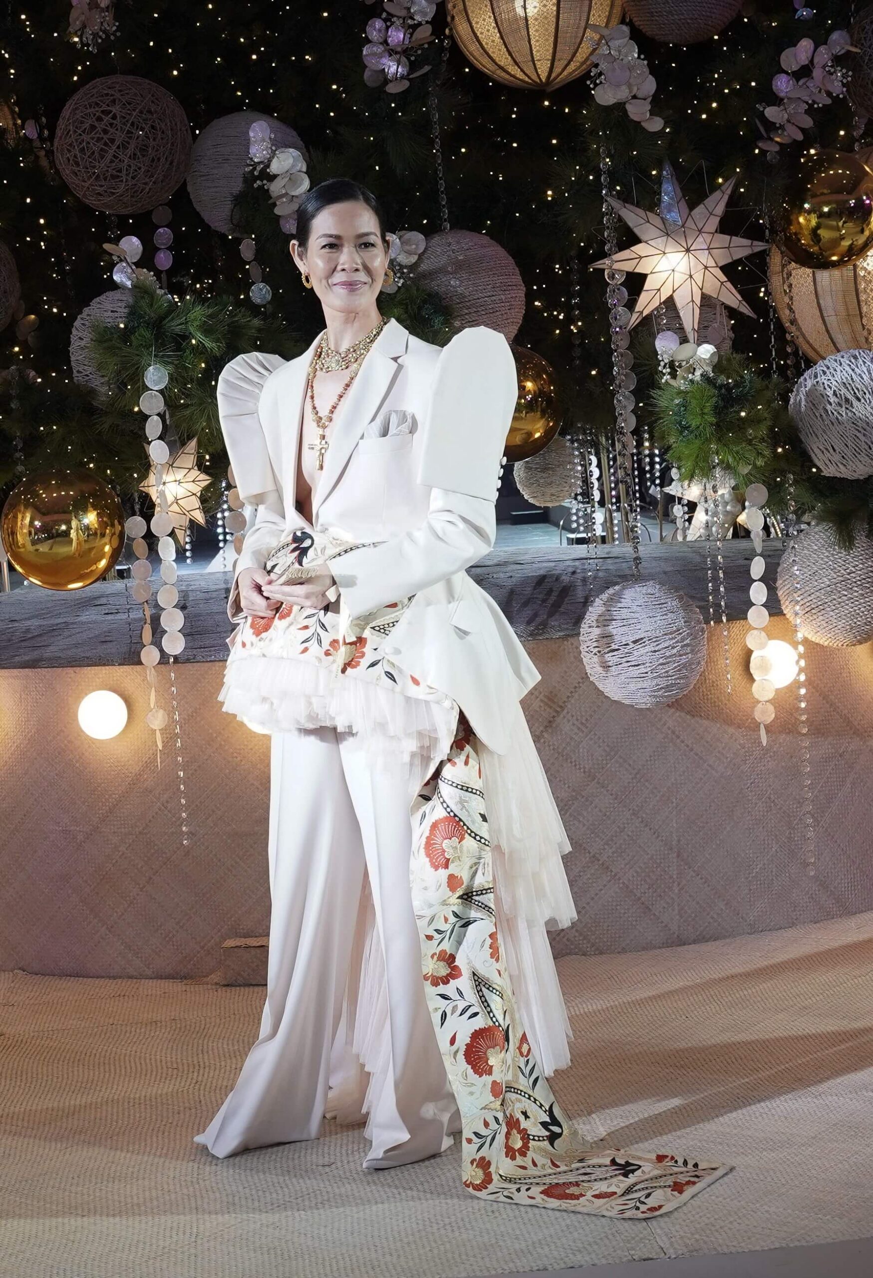 Model-photographer Jo Ann Bitagcol showcases Joey Samson's creation, seamlessly bridging the gap between menswear and womenswear