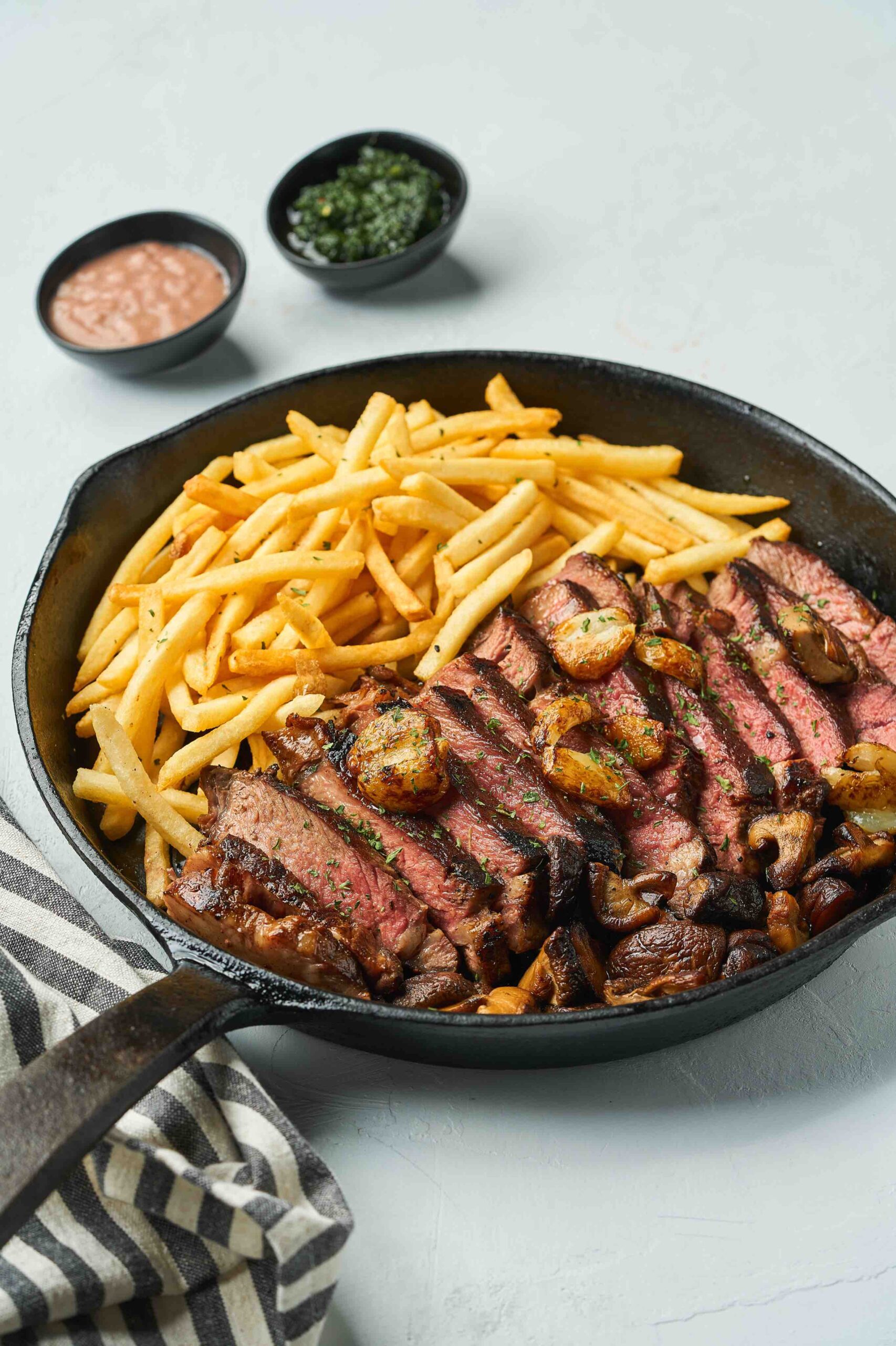 Crown Street Kitchen's Steak Frites: Australian rib-eye steak with fries, boardelaise, roasted mushroom
