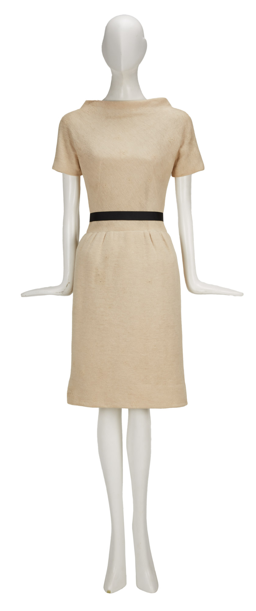 A cream-colored Givenchy dress that Hepburn also wore in “Charade”